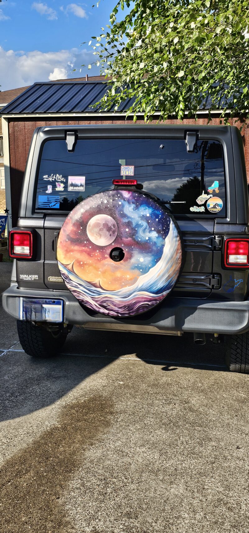 Spare tire cover installed on Jeep - Moon design customer review
